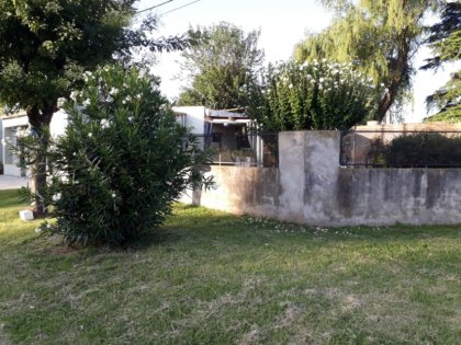 Casa en buen estado, amplio terreno en esquina- Ideal Inversión