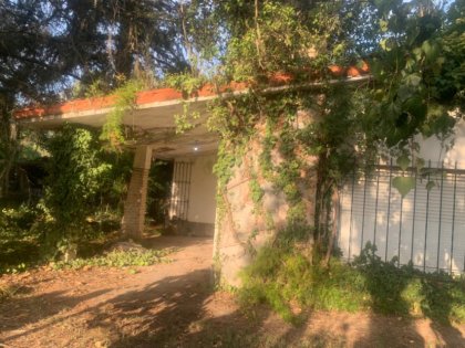Vendemos Terrenos en PNLG (con escritura) C/ Inmueble para refaccionar o demoler.